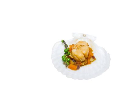 Fried scallop with vegetables and pepper on white background