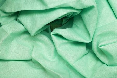Green cloth as a abstract background.の写真素材