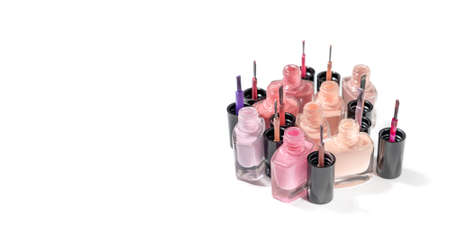 Set of nail polish bottles with brushes. Group of nail polish isolated on white background. copy spaceの写真素材