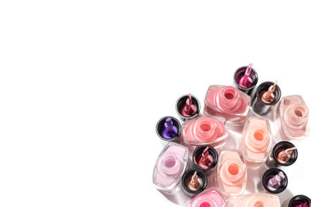 Set of nail polish bottles with brushes. Group of nail polish isolated on white background. copy spaceの写真素材