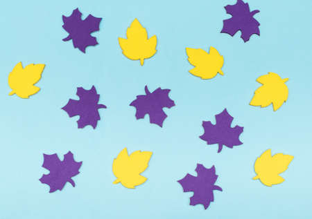 leaves seamless pattern. Purple and yellow paper autumn leaves. autumn leaves texture print and decorationの写真素材