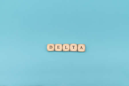 Covid-19 delta word on wooden cubes.の写真素材