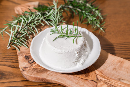 Piece of Ricotta cheese. Top italian cheeses - Ricotta Cheese. Ricotta cheese or cottage cheese with...