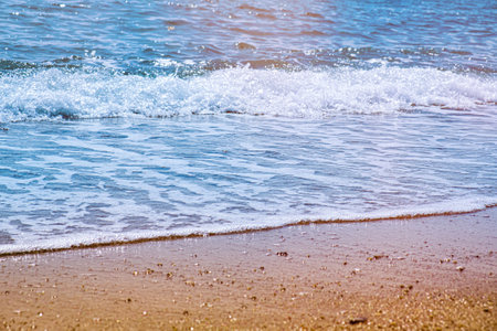 Beautiful scenic sea landscape with clear water. Wave by the sea on a sunny dayの写真素材