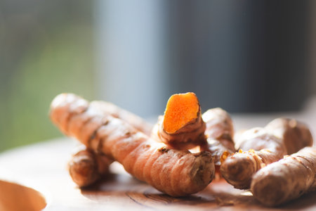 Fresh turmeric roots on a green leaf, close upの写真素材