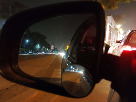 a car mirror showing upcoming cars.の写真素材