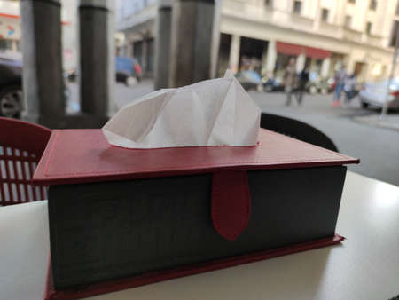 a box of napkin in a restaurant tableの写真素材