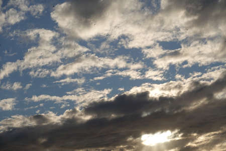 a blue sky full of beautiful cloudsの写真素材