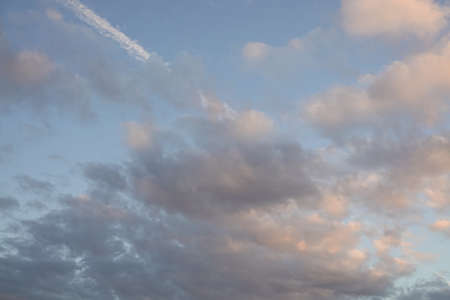 a blue sky full of beautiful cloudsの写真素材