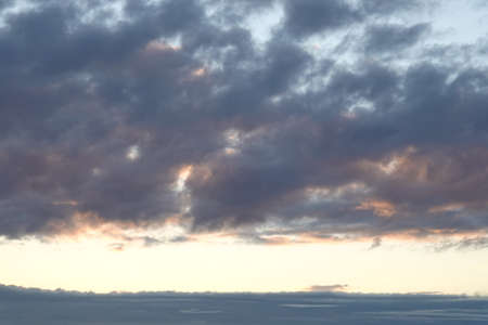 a blue sky full of beautiful cloudsの写真素材