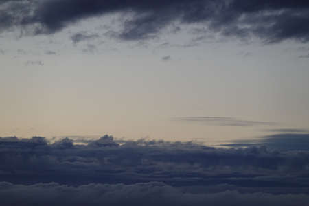a blue sky full of beautiful cloudsの写真素材
