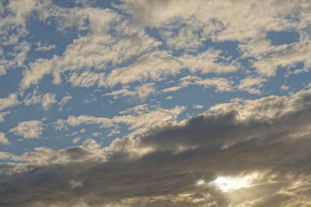 a blue sky full of beautiful cloudsの写真素材