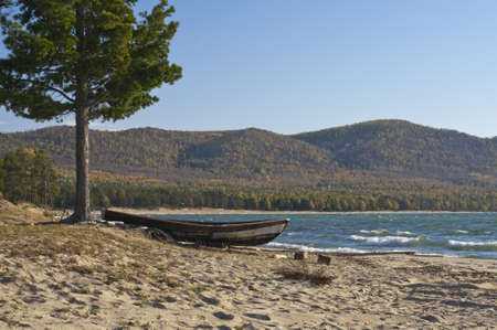 Boat on Baikal shoreの写真素材