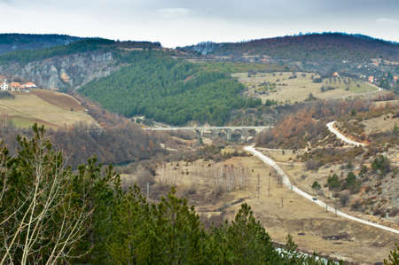 Valley with arc bridge.View from Uvaz damの写真素材