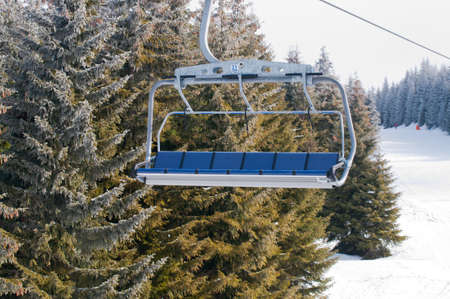 Ski lift with chairs in Kopaonik resort. Serbia.の写真素材