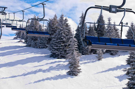 Ski lift with chairs in Kopaonik resort. Serbia.の写真素材