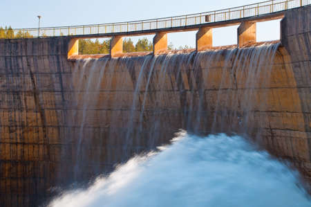 Rybniza Jezero Dam with streaming water from gateの写真素材