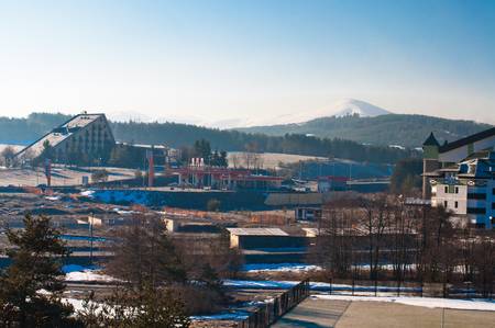 General view of Zlatibor hotels with oil station and hills. Zlatibor, Serbia, March 2013.のeditorial素材