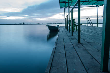 Berth with boats in night on Volgaの写真素材