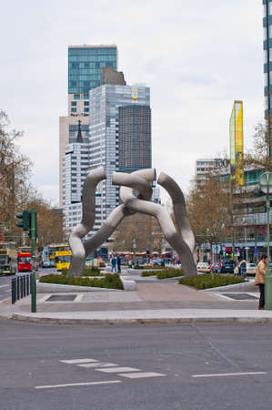 Unity monument and Gedachtniskirche in Berlin with walking people around. Berlin 2013.のeditorial素材