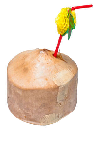 Coconut with straw, roughly hewn, isolated on whiteの写真素材