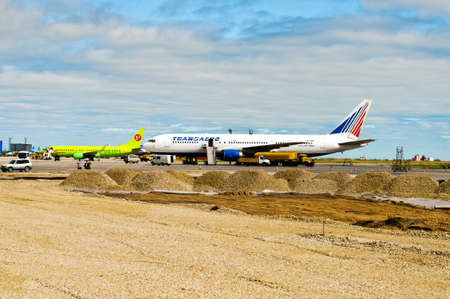 aircrafts at reconstructed airfield with digged groundのeditorial素材
