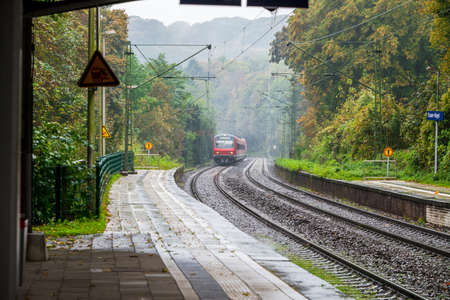 Coming train to station in west germanyの写真素材