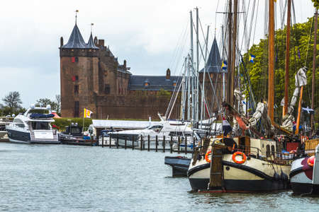 MUIDEN, NETHERLANDS - 11 May 2014 Muiden castle with boats on 11 May 2014, Muiden, Netherlandsのeditorial素材