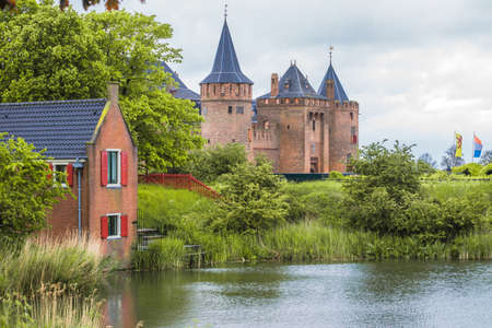 View on the Muiderslot, Muiden castle, in Netherlands in cloudy day.のeditorial素材