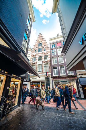 AMSTERDAM  - 09 May 2014 Tourist crowd on trade street on 09 May in Amsterdam.のeditorial素材
