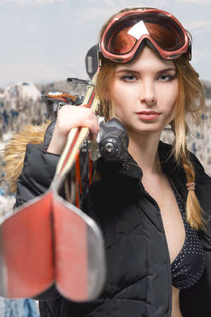 Extreme girl portrait with freeride ski and glassesの写真素材