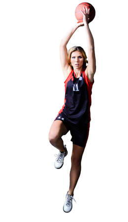 Professional basketball player Throwing in jump isolated on whiteの写真素材