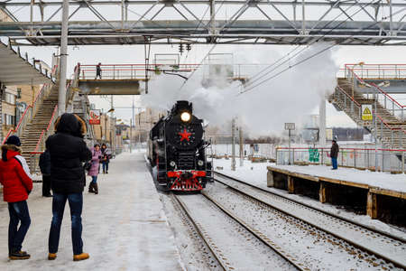 MOSCOW  - 08 January 2015  Old steam locomotive coming to city station Kr.Baltiec on 08 January 2015...
