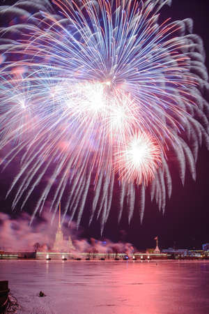 Sankt-Peterburg - FEB 23 2015: Firework above Petropavlov fortress in a day of soviet army on February 23, 2015, Sankt-Petesburg, Russiaのeditorial素材
