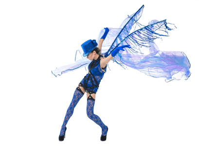 Emotional dance in blue suit of cute young womanの写真素材