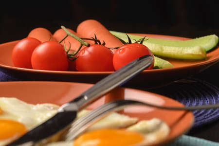 Food for bachelor breakfast with dishes on table. Front view.の写真素材