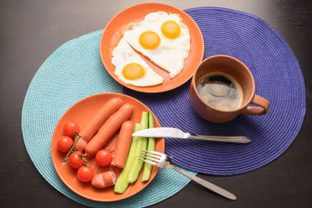 Food for bachelor breakfast with dishes on table. Top view.の写真素材