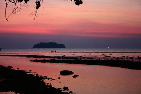Fishing Boat at Sunsetの写真素材