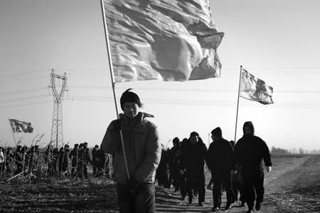 Cold winter, in order to exercise the will of the students, the school organized students to long-distance walking. December 30, 2010, Xingtai City, Hebei Province, Chinaのeditorial素材