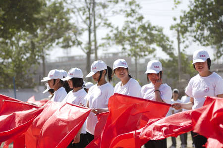 In the Student Games, held a grand opening ceremony. Performed by students and teachers, the spectacular show. This is the primary performance programs. Xingtai City, Hebei Province, China, May 12, 2011.のeditorial素材