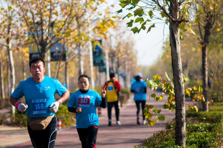 November 17, 2013, Xingtai City, Hebei Province, the first Marathon was held in the Green Mile Creek fitness trail. China Xingtai City, Hebei Province, Nov. 17, 2013.のeditorial素材
