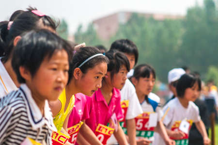 Baixiang County, Hebei Province, China, May 14, 2013. Student Games, the track venue, athletes are waiting for the starting signal.のeditorial素材