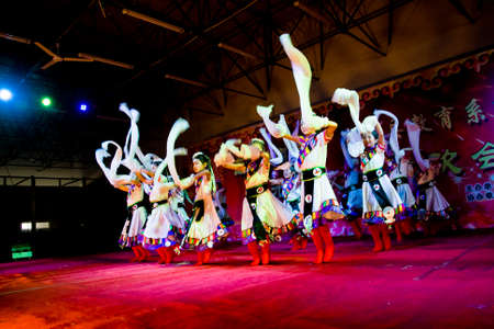 China XingTai City BaiXiang County,December 31, 2014:  the school held a wonderful New Year's day party. Unidentified children performed wonderful performances.のeditorial素材