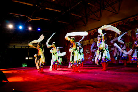China XingTai City BaiXiang County,December 31, 2014:  the school held a wonderful New Year's day party. Unidentified children performed wonderful performances.のeditorial素材