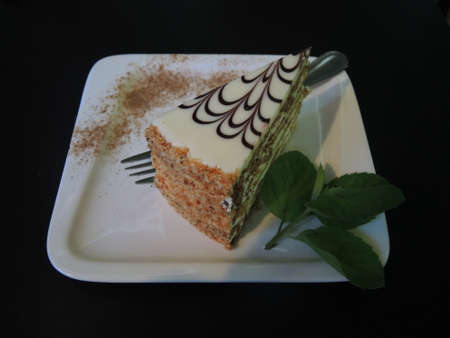 A piece of layer cake on a plate