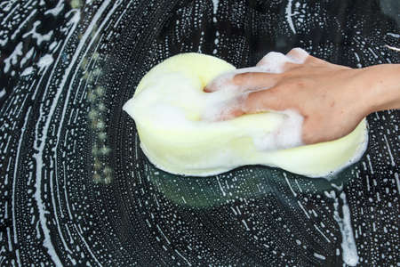 Handle sponge are clear car glassの写真素材