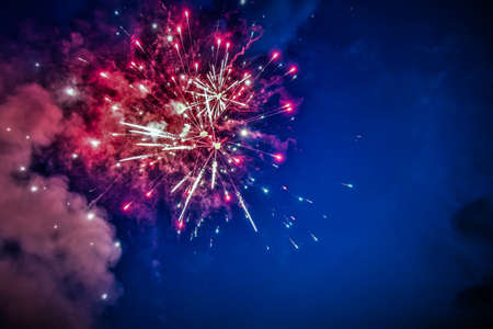 Beautiful holidays fireworks in night sky, creative design, night and magicの写真素材