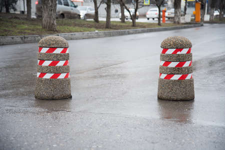 Parking barrier. Anti-Parking columns made of concrete. Entry is prohibited.の写真素材