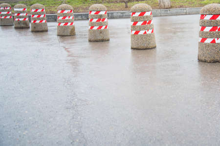 Parking barrier. Anti-Parking columns made of concrete. Entry is prohibited.の写真素材