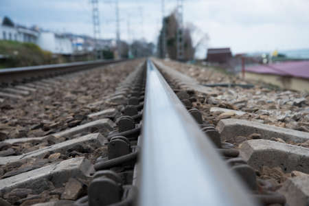 The rail goes off into the distance. Railroad track. Concept. Traveling by rail.の写真素材